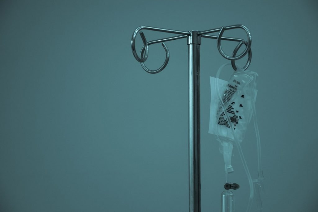 a iv bag on a metal stand