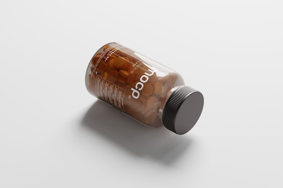 a bottle of pills sitting on top of a table