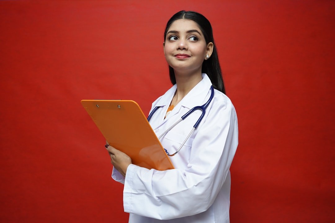 a person holding a laptop